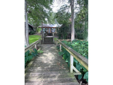 Enjoy the best of Lake Bruin living at this fully furnished on Lake Bruin Golf and Country Club in Louisiana - for sale on GolfHomes.com, golf home, golf lot