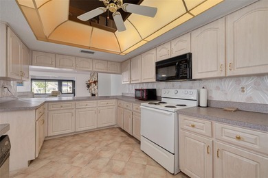 Welcome to this inviting waterfront community, where a tropical on Gulf Harbors Golf Course in Florida - for sale on GolfHomes.com, golf home, golf lot