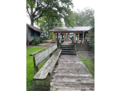 Enjoy the best of Lake Bruin living at this fully furnished on Lake Bruin Golf and Country Club in Louisiana - for sale on GolfHomes.com, golf home, golf lot