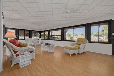 Welcome to this inviting waterfront community, where a tropical on Gulf Harbors Golf Course in Florida - for sale on GolfHomes.com, golf home, golf lot