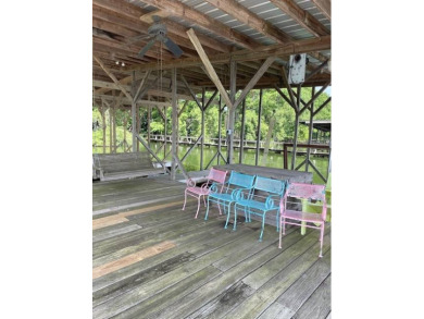 Enjoy the best of Lake Bruin living at this fully furnished on Lake Bruin Golf and Country Club in Louisiana - for sale on GolfHomes.com, golf home, golf lot