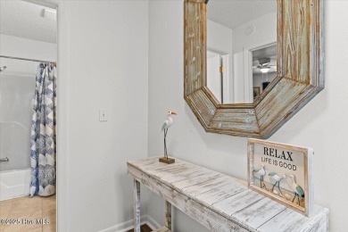 Discover Your Fully Furnished Island Haven with Direct Beach on Founders Club At St. James Plantation in North Carolina - for sale on GolfHomes.com, golf home, golf lot