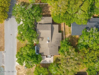 Discover Your Fully Furnished Island Haven with Direct Beach on Founders Club At St. James Plantation in North Carolina - for sale on GolfHomes.com, golf home, golf lot
