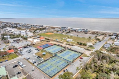 Discover Your Fully Furnished Island Haven with Direct Beach on Founders Club At St. James Plantation in North Carolina - for sale on GolfHomes.com, golf home, golf lot