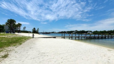 Welcome home to Sailmaker's Place, nestled along the sugar-white on Lost Key Golf Club in Florida - for sale on GolfHomes.com, golf home, golf lot