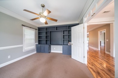 Welcome to 4880 Turnberry Lane - a classic Southern home with on Maple Ridge Golf Club in Georgia - for sale on GolfHomes.com, golf home, golf lot