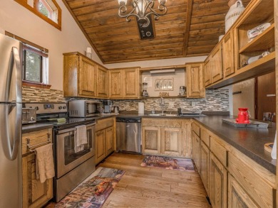 Tucked among mature pines and just a short walk to Monte Verde on Angel Fire Resort Country Club in New Mexico - for sale on GolfHomes.com, golf home, golf lot