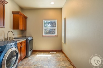 Luxury living meets golf course serenity at 2240 Saddleback in on Laurel Golf Club in Montana - for sale on GolfHomes.com, golf home, golf lot