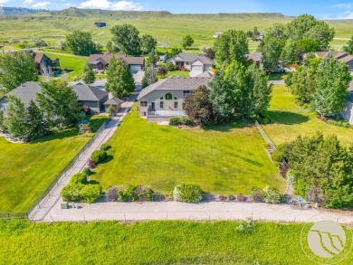 Luxury living meets golf course serenity at 2240 Saddleback in on Laurel Golf Club in Montana - for sale on GolfHomes.com, golf home, golf lot