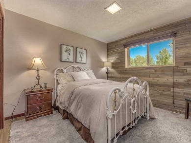 Tucked among mature pines and just a short walk to Monte Verde on Angel Fire Resort Country Club in New Mexico - for sale on GolfHomes.com, golf home, golf lot