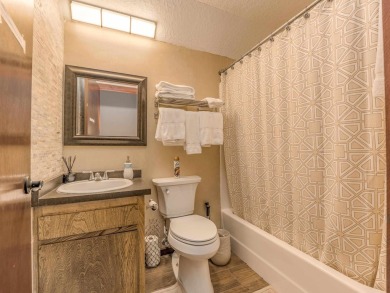 Tucked among mature pines and just a short walk to Monte Verde on Angel Fire Resort Country Club in New Mexico - for sale on GolfHomes.com, golf home, golf lot