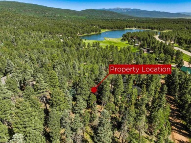 Tucked among mature pines and just a short walk to Monte Verde on Angel Fire Resort Country Club in New Mexico - for sale on GolfHomes.com, golf home, golf lot