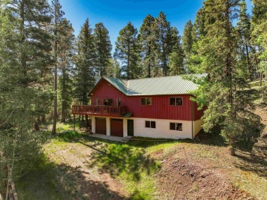 Tucked among mature pines and just a short walk to Monte Verde on Angel Fire Resort Country Club in New Mexico - for sale on GolfHomes.com, golf home, golf lot