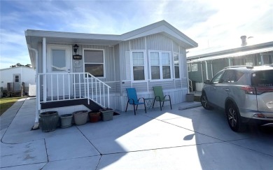 WELL KEPT CHARIOT MOBILE HOME IN ACTIVE 55+ COMMUNITY! One on River Run Golf Links in Florida - for sale on GolfHomes.com, golf home, golf lot