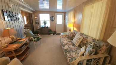 WELL KEPT CHARIOT MOBILE HOME IN ACTIVE 55+ COMMUNITY! One on River Run Golf Links in Florida - for sale on GolfHomes.com, golf home, golf lot