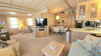 WELL KEPT CHARIOT MOBILE HOME IN ACTIVE 55+ COMMUNITY! One on River Run Golf Links in Florida - for sale on GolfHomes.com, golf home, golf lot