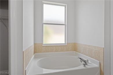 WELCOME TO PARADISE!! This well maintained three bedroom, two on Gateway Golf and Country Club in Florida - for sale on GolfHomes.com, golf home, golf lot