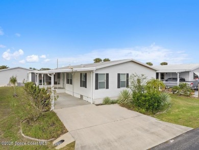 New roof coming; AC is 2018; double driveway. This home is one on Barefoot Bay Golf Course in Florida - for sale on GolfHomes.com, golf home, golf lot