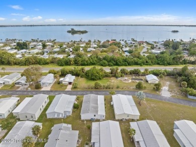 New roof coming; AC is 2018; double driveway. This home is one on Barefoot Bay Golf Course in Florida - for sale on GolfHomes.com, golf home, golf lot