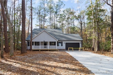 MOVE-IN READY NEW CONSTRUCTION!!! Welcome to this stunning home on Carolina Trace Country Club in North Carolina - for sale on GolfHomes.com, golf home, golf lot