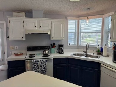 This home is in a 55 plus community with a monthly lot rent of on Crystal Lake Club in Florida - for sale on GolfHomes.com, golf home, golf lot