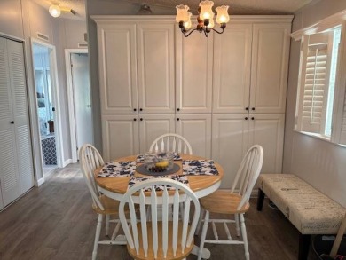 This home is in a 55 plus community with a monthly lot rent of on Crystal Lake Club in Florida - for sale on GolfHomes.com, golf home, golf lot