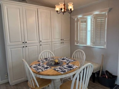 This home is in a 55 plus community with a monthly lot rent of on Crystal Lake Club in Florida - for sale on GolfHomes.com, golf home, golf lot