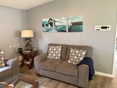 This home is in a 55 plus community with a monthly lot rent of on Crystal Lake Club in Florida - for sale on GolfHomes.com, golf home, golf lot