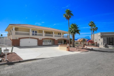 Take a look at this BEAUTIFUL home right on the Lake Havasu Golf on London Bridge Golf Course in Arizona - for sale on GolfHomes.com, golf home, golf lot