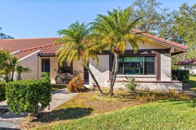 THIS GORGEOUS END UNIT TURN KEY WATER VIEW VILLA HAS BEEN on Palm Aire Country Club of Sarasota in Florida - for sale on GolfHomes.com, golf home, golf lot