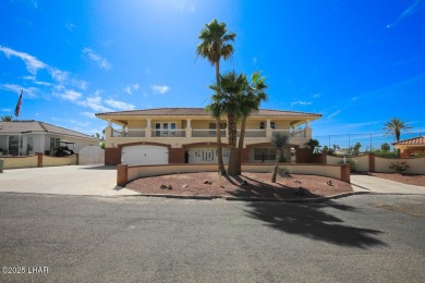 Take a look at this BEAUTIFUL home right on the Lake Havasu Golf on London Bridge Golf Course in Arizona - for sale on GolfHomes.com, golf home, golf lot