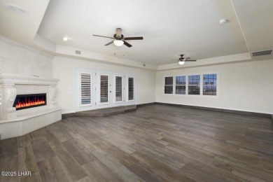 Take a look at this BEAUTIFUL home right on the Lake Havasu Golf on London Bridge Golf Course in Arizona - for sale on GolfHomes.com, golf home, golf lot