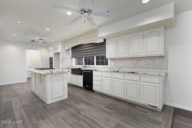 Take a look at this BEAUTIFUL home right on the Lake Havasu Golf on London Bridge Golf Course in Arizona - for sale on GolfHomes.com, golf home, golf lot