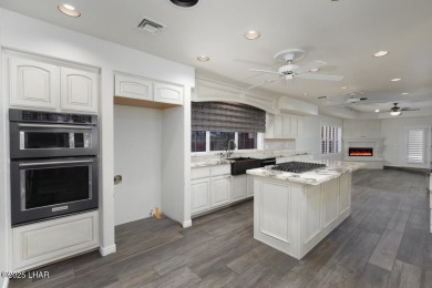 Take a look at this BEAUTIFUL home right on the Lake Havasu Golf on London Bridge Golf Course in Arizona - for sale on GolfHomes.com, golf home, golf lot