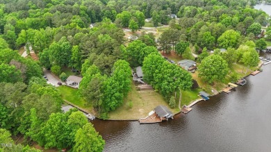 This cozy 2-bedroom, 2-bath home offers the perfect blend of on River Golf and County Club at Lake Royale in North Carolina - for sale on GolfHomes.com, golf home, golf lot