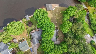 This cozy 2-bedroom, 2-bath home offers the perfect blend of on River Golf and County Club at Lake Royale in North Carolina - for sale on GolfHomes.com, golf home, golf lot