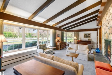 Mid-century modern classic, designed by renowned Charlevoix on Charlevoix Golf Club in Michigan - for sale on GolfHomes.com, golf home, golf lot
