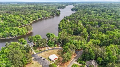 This cozy 2-bedroom, 2-bath home offers the perfect blend of on River Golf and County Club at Lake Royale in North Carolina - for sale on GolfHomes.com, golf home, golf lot