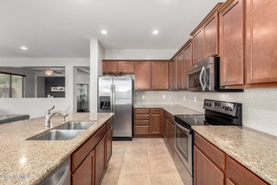 Welcome to this beautifully maintained 3-bedroom, 2-bath home in on Wigwam Golf  Resort Litchfield Park  in Arizona - for sale on GolfHomes.com, golf home, golf lot