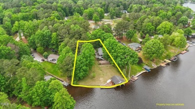 This cozy 2-bedroom, 2-bath home offers the perfect blend of on River Golf and County Club at Lake Royale in North Carolina - for sale on GolfHomes.com, golf home, golf lot