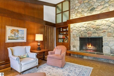 Mid-century modern classic, designed by renowned Charlevoix on Charlevoix Golf Club in Michigan - for sale on GolfHomes.com, golf home, golf lot