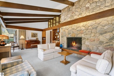 Mid-century modern classic, designed by renowned Charlevoix on Charlevoix Golf Club in Michigan - for sale on GolfHomes.com, golf home, golf lot
