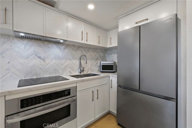 See the Laguna Woods Smart Home that everyone's talking about on Leisure Village Par 3 Golf Course in California - for sale on GolfHomes.com, golf home, golf lot