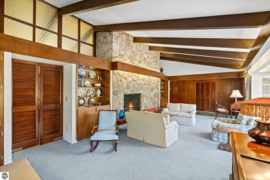 Mid-century modern classic, designed by renowned Charlevoix on Charlevoix Golf Club in Michigan - for sale on GolfHomes.com, golf home, golf lot