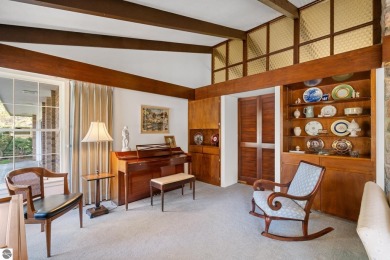 Mid-century modern classic, designed by renowned Charlevoix on Charlevoix Golf Club in Michigan - for sale on GolfHomes.com, golf home, golf lot