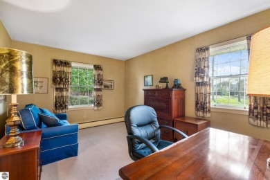 Mid-century modern classic, designed by renowned Charlevoix on Charlevoix Golf Club in Michigan - for sale on GolfHomes.com, golf home, golf lot