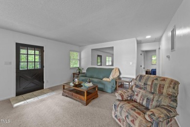 This cozy 2-bedroom, 2-bath home offers the perfect blend of on River Golf and County Club at Lake Royale in North Carolina - for sale on GolfHomes.com, golf home, golf lot