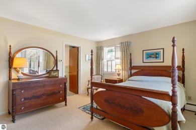 Mid-century modern classic, designed by renowned Charlevoix on Charlevoix Golf Club in Michigan - for sale on GolfHomes.com, golf home, golf lot