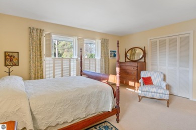 Mid-century modern classic, designed by renowned Charlevoix on Charlevoix Golf Club in Michigan - for sale on GolfHomes.com, golf home, golf lot