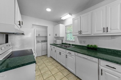 This cozy 2-bedroom, 2-bath home offers the perfect blend of on River Golf and County Club at Lake Royale in North Carolina - for sale on GolfHomes.com, golf home, golf lot